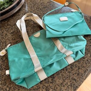Bric’s Stylish Teal Tote and shoulder make up bag